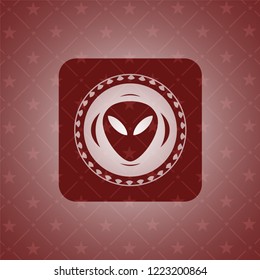 alien icon inside vintage red emblem