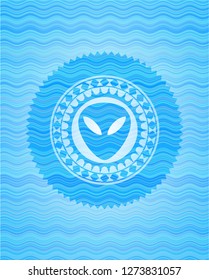 alien icon inside water wavec oncept emblem.