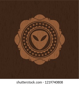 alien icon inside wood emblem. Vintage.