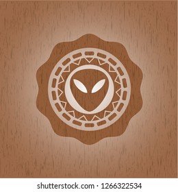 alien icon inside wood emblem. Retro