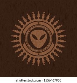 alien icon inside wood emblem. Retro