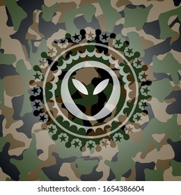 Außerirdische Ikone auf Camo-Textur