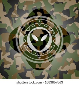 alien icon on camouflage texture. 