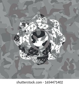 alien icon on grey camo pattern