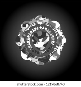 alien icon on grey camouflage texture