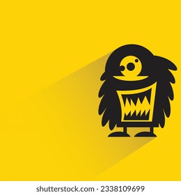 alien monster character with shadow on yellow background