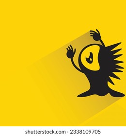 alien monster character with shadow on yellow background