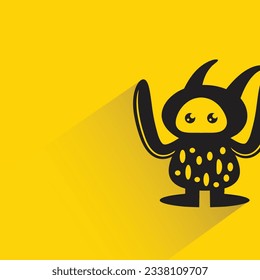alien monster character with shadow on yellow background