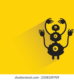personaje monstruo extraño con sombra sobre fondo amarillo