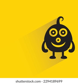 monstruo alienígena con sombra sobre fondo amarillo