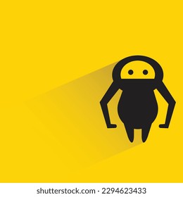 alien monster with shadow on yellow background
