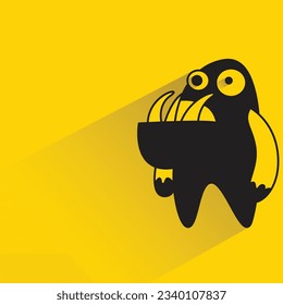 alien monster with shadow on yellow background