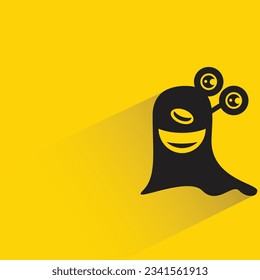 alien monster with shadow on yellow background