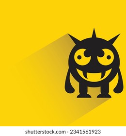 alien monster with shadow on yellow background