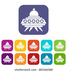 Alien spaceship icons set vector illustration in flat style in colors red, blue, green, and other