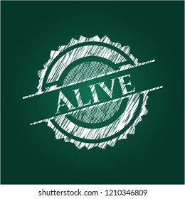 Alive written on a chalkboard