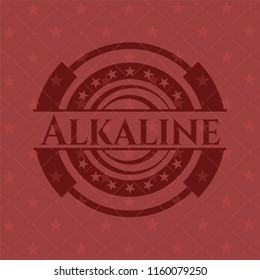 Alkaline badge with red background