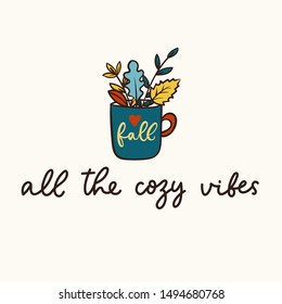 All the cozy vibes lettering inspirational card vector illustration. Inspirational quote written in black font with cup full of fall foliage on white background flat style for motivation, mug, print