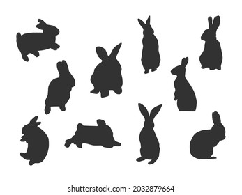 All different pose black shadow of rabbit distributed on white background. 