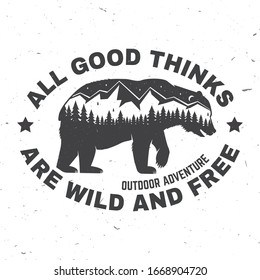 All good things are wild and free. Outdoor adventure. Vector illustration. Concept for shirt or logo, print, stamp or tee. Vintage typography design with bear, forest and mountain landscape silhouette