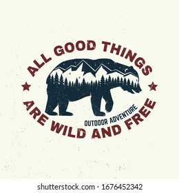 All good things are wild and free. Outdoor adventure. Vector illustration. Concept for shirt or logo, print, stamp or tee. Vintage typography design with bear, forest and mountain landscape silhouette