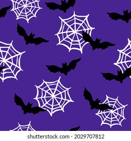 All over Halloween seamless vector repeat pattern with black bat and spiderweb silhouettes on dark purple background