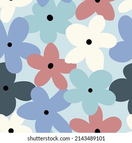 todo sobre el patrón de flores multicolor del vector floral sin fisuras sobre fondo azul
