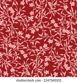 all over seamless floral vector small flowers with leaves pattern on red background
