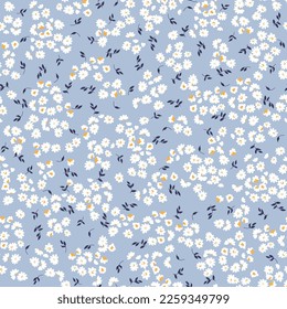 all over seamless floral vector white small flowers with leaves pattern on blue background