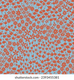 all over seamless floral vector orange small flowers leaves pattern on blue background
