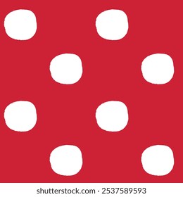 All over seamless repeat pattern with white polka dots with grunge edges half drop on Christmas red. Simple versatile background for Christmas and everyday wrap, packaging, fabric, wallpaper.