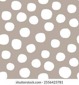 All over seamless repeat pattern with hand drawn irregular white polka dots on warm neutral tan. Universal trendy modern background with tossed dots for beige baby, packaging, wrap, wallpaper, fabric