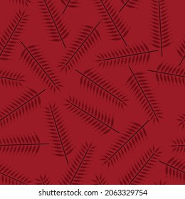 all over seamless vector red leaves pattern on red background