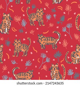 All over seamless vector repeat pattern with happy doodle tigers on bright festive red background. Cute funny kids backdrop for Chinese New year of the tiger. Palm leaves tossed around