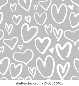 All over seamless vector repeat pattern with irregular hand drawn white doodle hearts on light gray background. Versatile Valentines day love backdrop