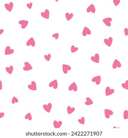 All over seamless vector repeat pattern with ditsy pink hand drawn doodle hearts tossed on white background. Simple cute Valentines day background