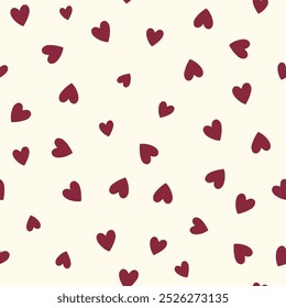 All over seamless vector repeat pattern with ditsy small burgundy red hand drawn doodle hearts tossed on cream background. Simple cute Valentines day background