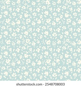 All over vector seamless repeat pattern with tiny ditsy tossed cream flowers on light blue background. Simple and versatile retro cottage everyday ditsy floral backdrop. Shabby chic floral backdrop.