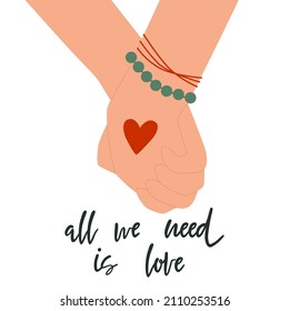 All we need is Love quote. Holding Hands with Heart isolated on white background. Romantic Hand drawn typography poster. Handwritten phrase. Flat Valentines day vector illustration.
