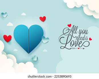 All You Need Is Love Font With Paper Hearts And Clouds Decorated On Light Turquoise Background. Happy Valentine's Day Concept.