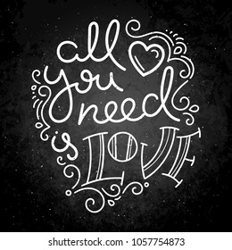 All you need is Love. Hand drawn modern image with hand-lettering and decoration elements on blackboard. Inspirational quote. Illustration for prints on t-shirts and bags, posters, cards.