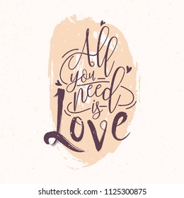 All You Need Is Love romantic phrase or quote written with elegant cursive font against pink round paint blot on background. Decorative vector illustration for Valentine's Day greeting card.