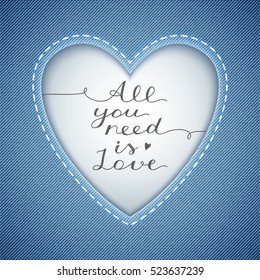 all you need is love, vector lettering in heart frame on denim texture