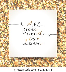 all you need is love, vector lettering on sparkles background in white paper page