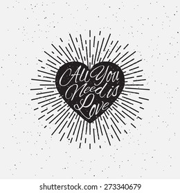 'All You Need is Love' vintage grunge hand lettering with heart and rays for t-shirt apparel, print, poster, card design etc. Vector Illustration.