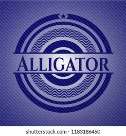 Alligator badge with denim background
