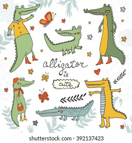 Alligator is cute. Colourful hand drawn set of crocodiles and alligators