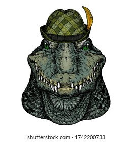 Alligator. Portrait of african agressive animal. Austrian bavarian tirol hat. Beer festival. Oktoberfest.