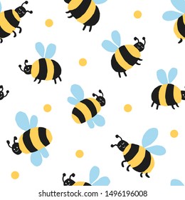 Allover seamless repeat pattern with big fat fluffy striped happy smiling bees and yellow polka dots