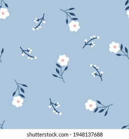 allover small vector flower design pattern on blue background